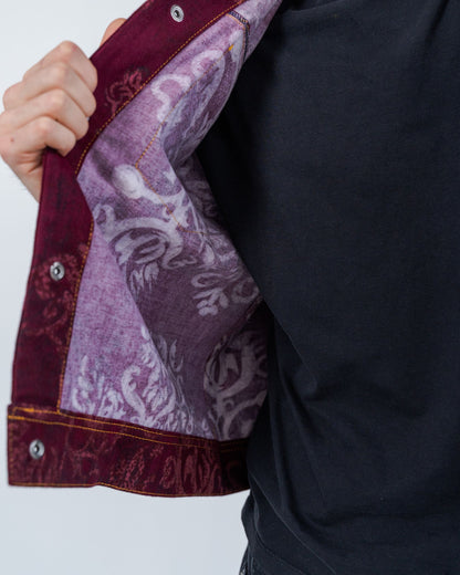 Close-up of the inside of burgundy floral jacket with snaps