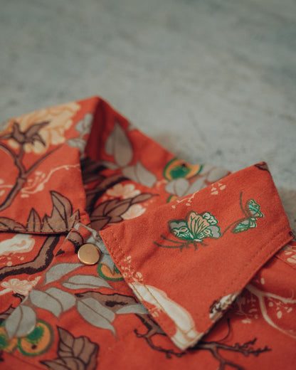 Close-up of a floral-patterned fabric of the upcycled jacket collar