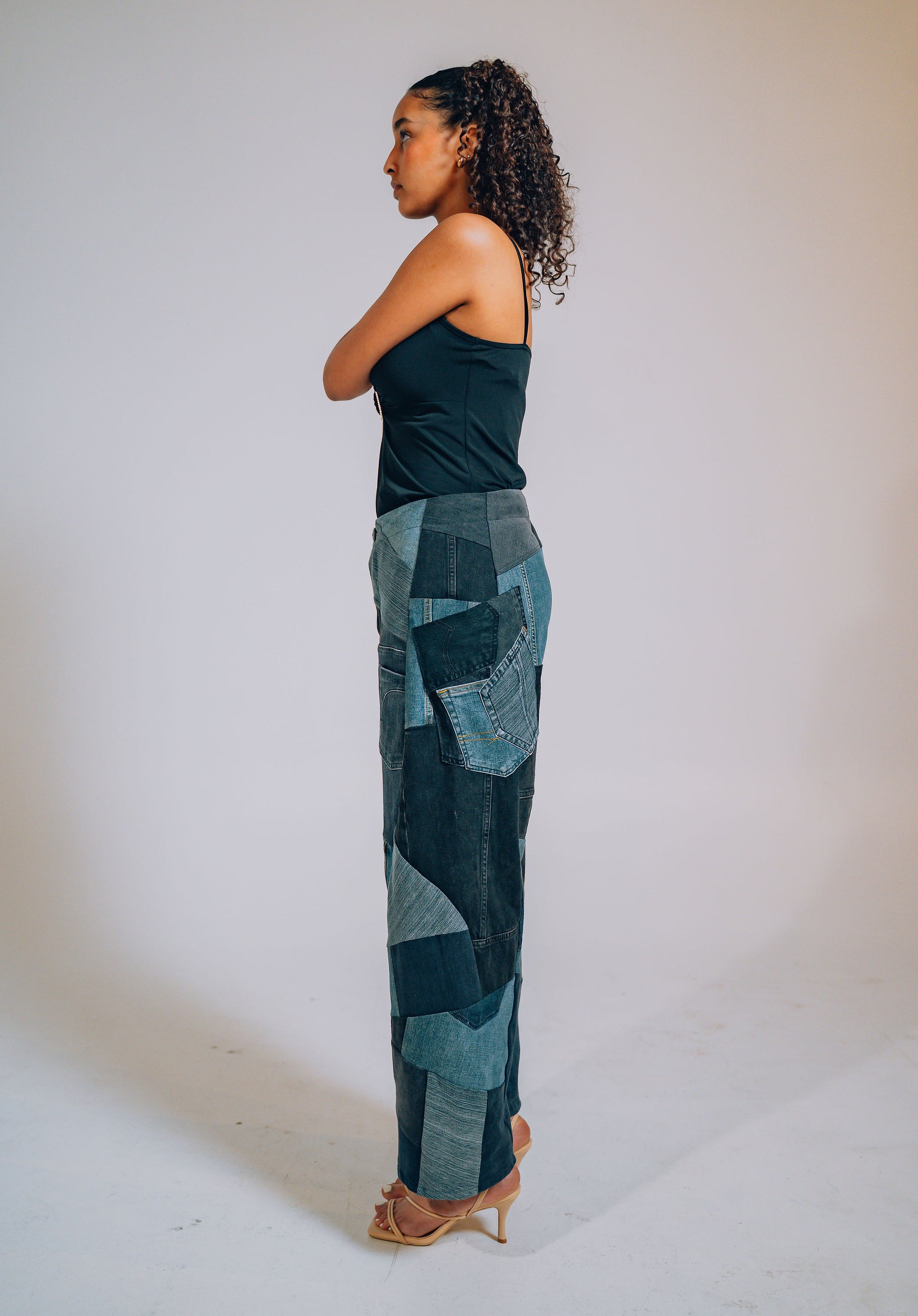 Woman wearing patchwork denim pants